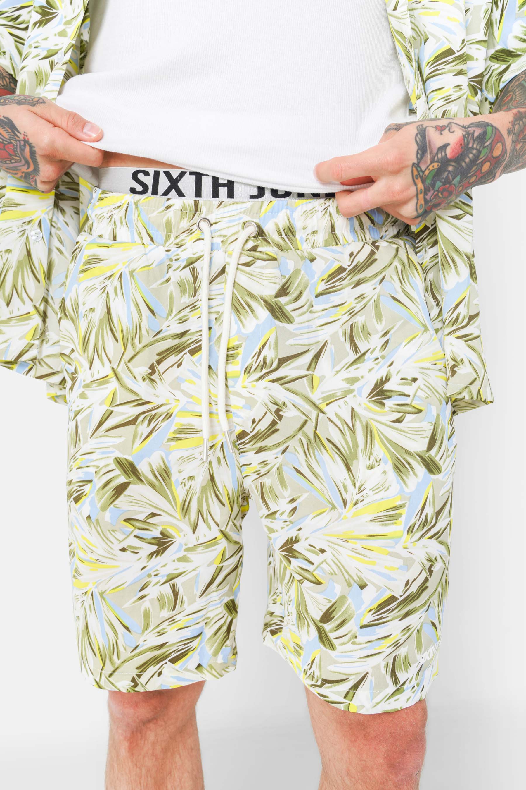 Flowy floral print shorts Green