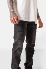 Slim-Jeans mit Kniebesatz Schwarz
