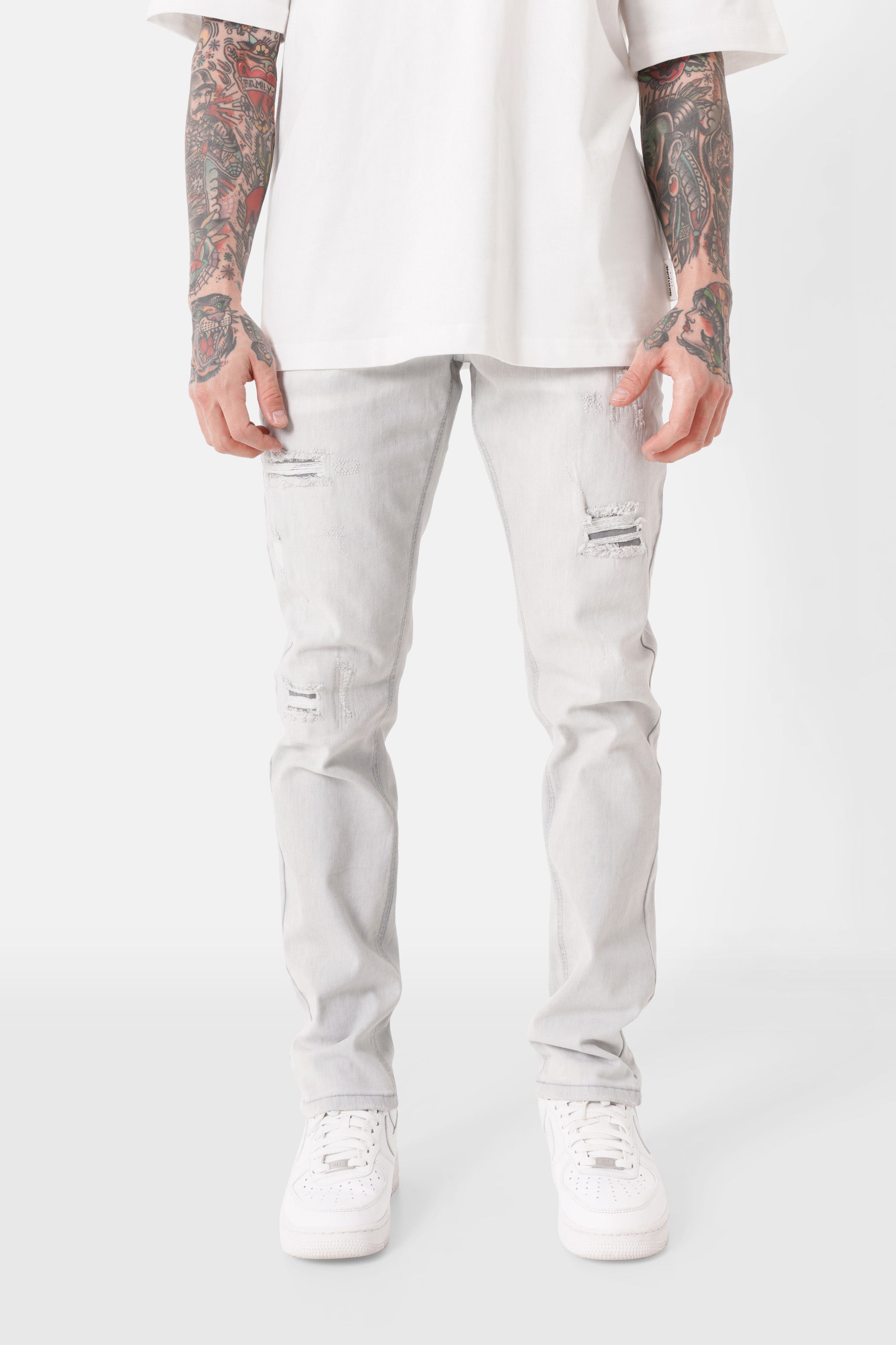 Jean slim patch effet usé Gris clair