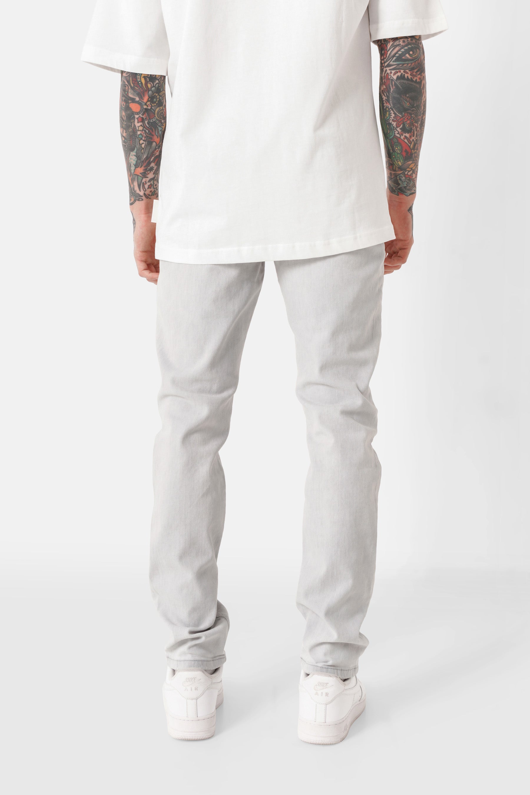 Jean slim patch effet usé Gris clair