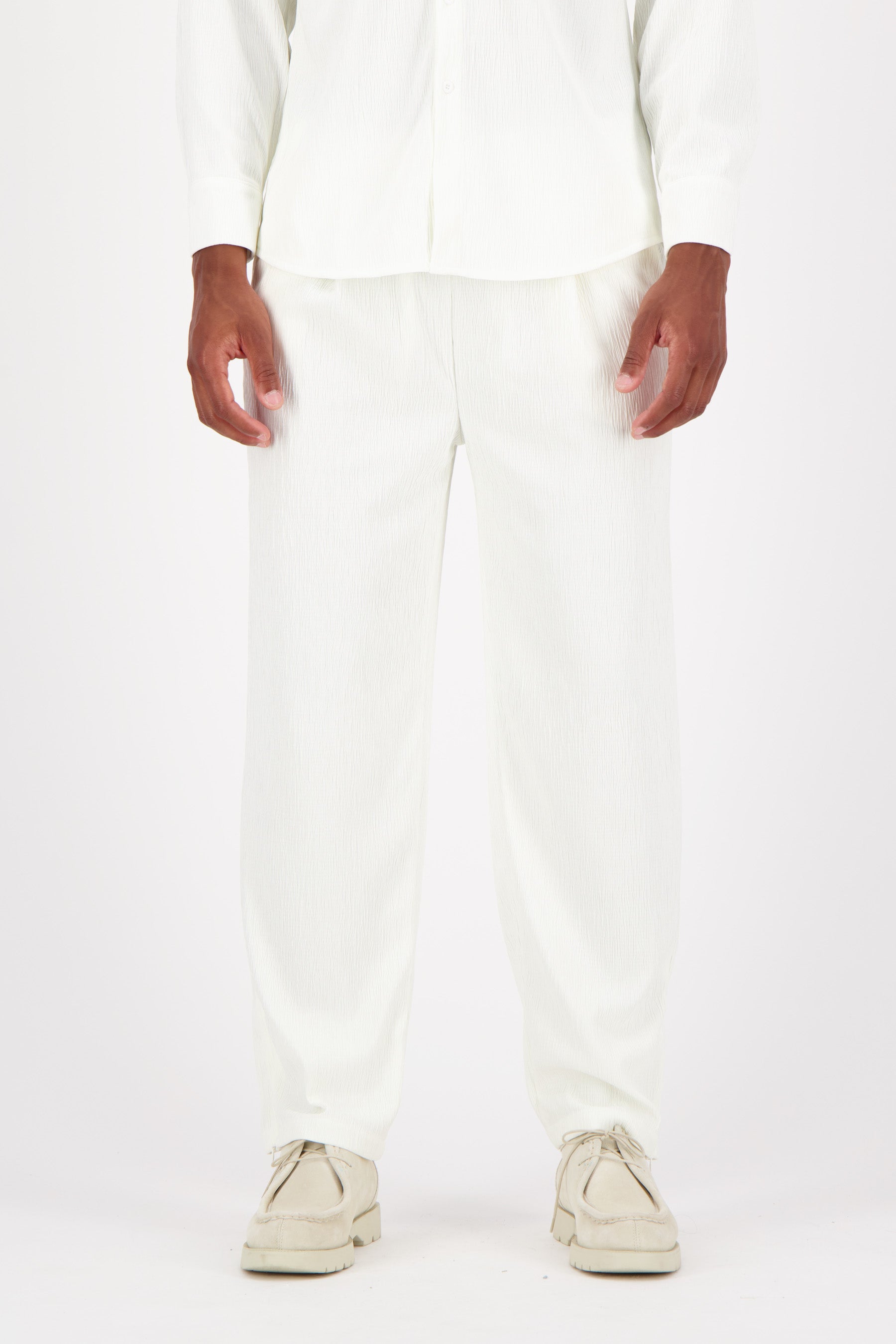 Shiny fluid textured pants White
