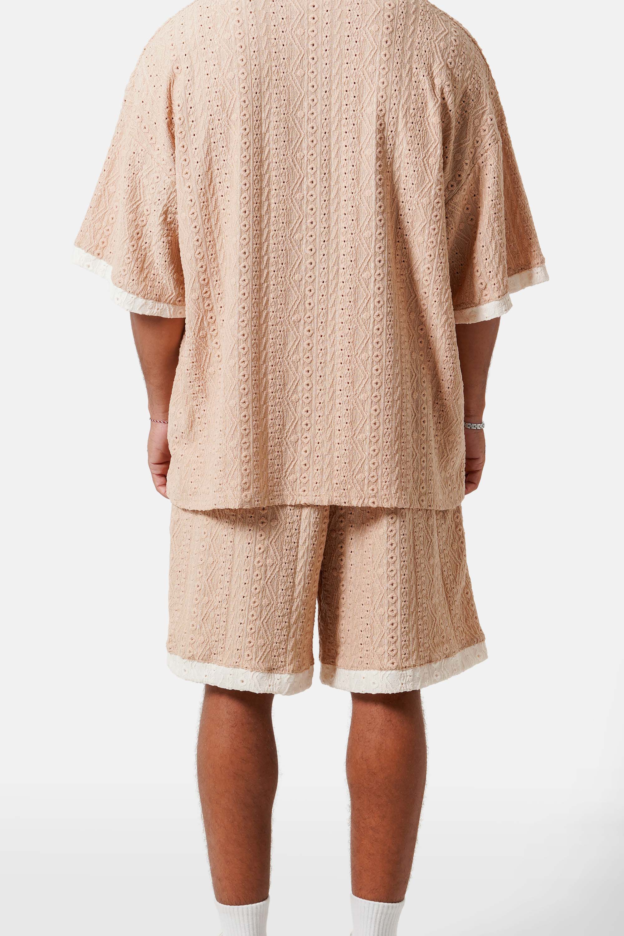 TEXTURED logo contrasted short