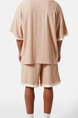 TEXTURED logo contrasted short