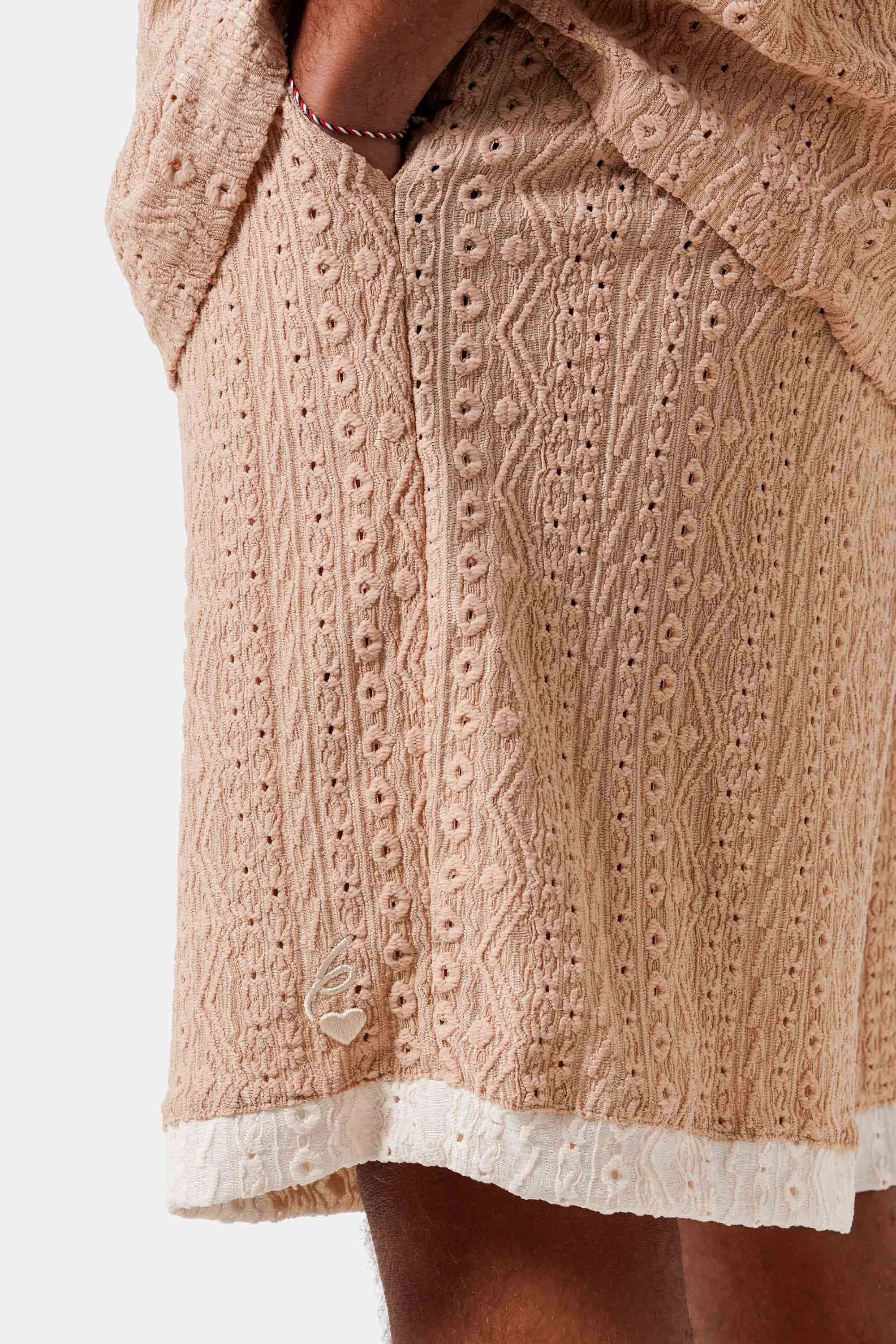 TEXTURED logo contrasted short