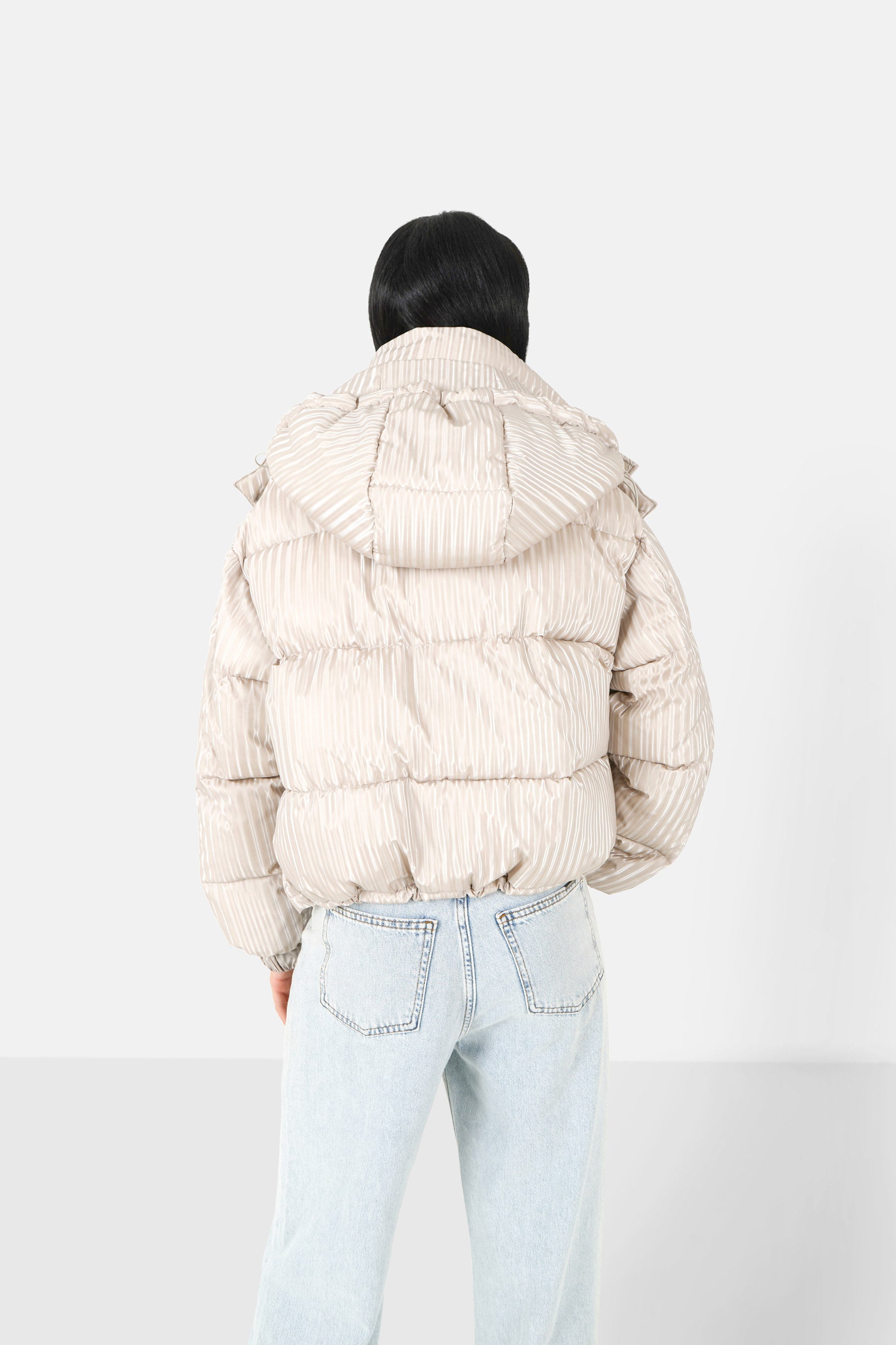 Iridescent down jacket + Beige bag