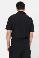 Schwarzes, plissiertes Poloshirt