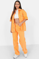 Orangefarbene, übergroße, bestickte Jacke