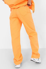 Orange bestickte weite Jeans