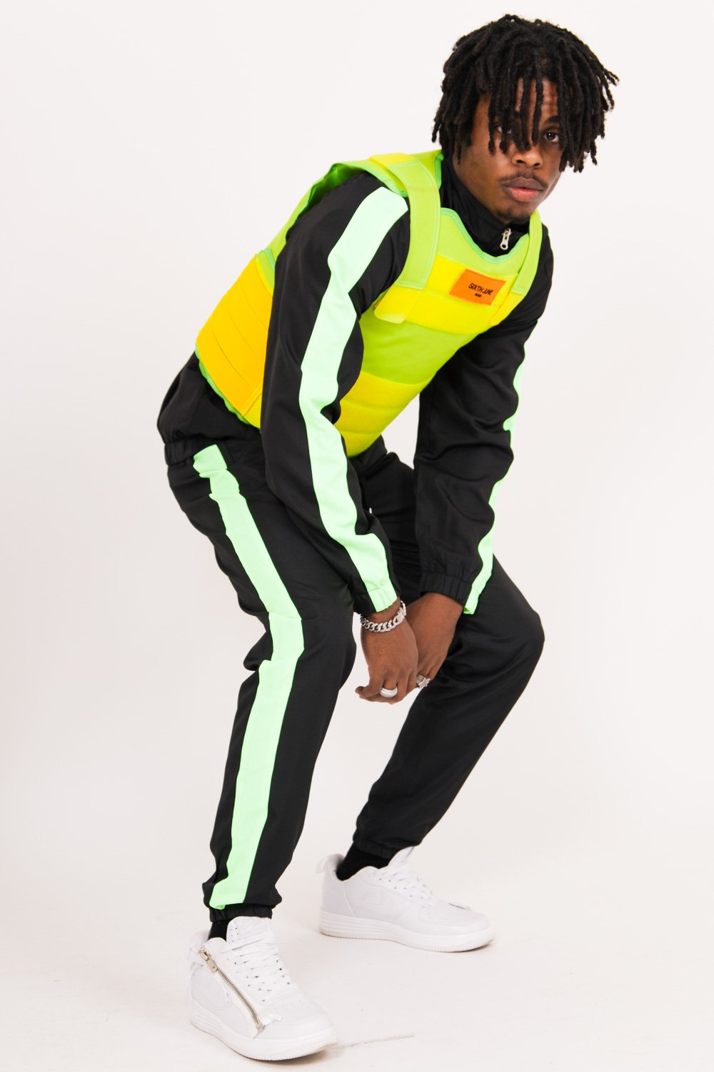 Neongrüne taktische Jacke mit Aufnäher