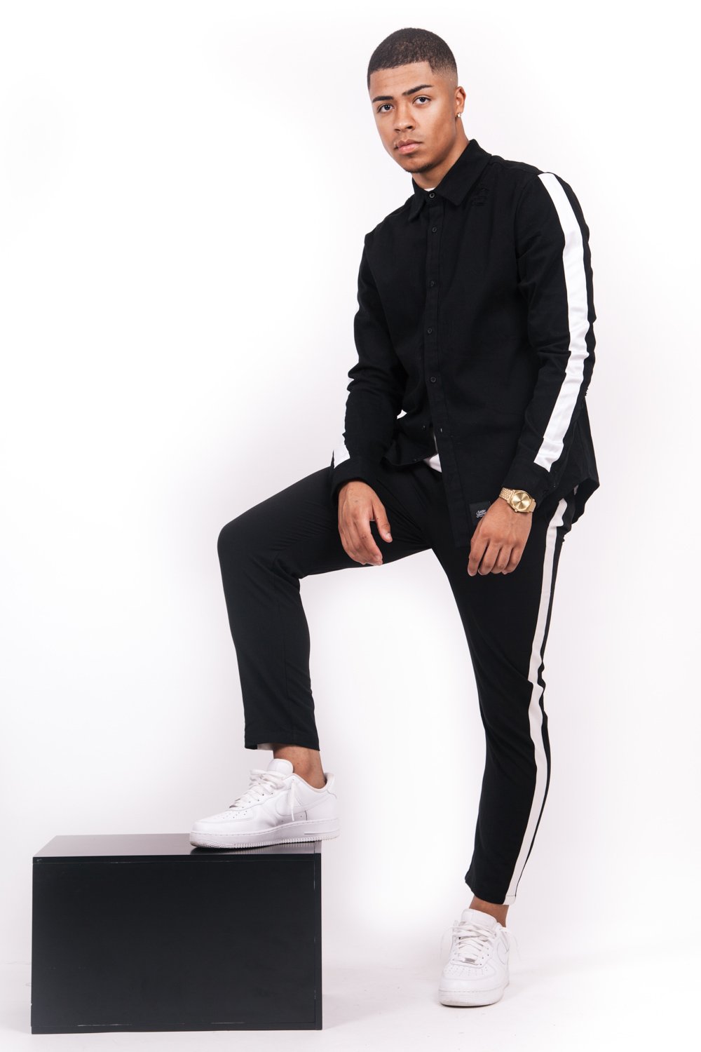 flowing bands white pants black