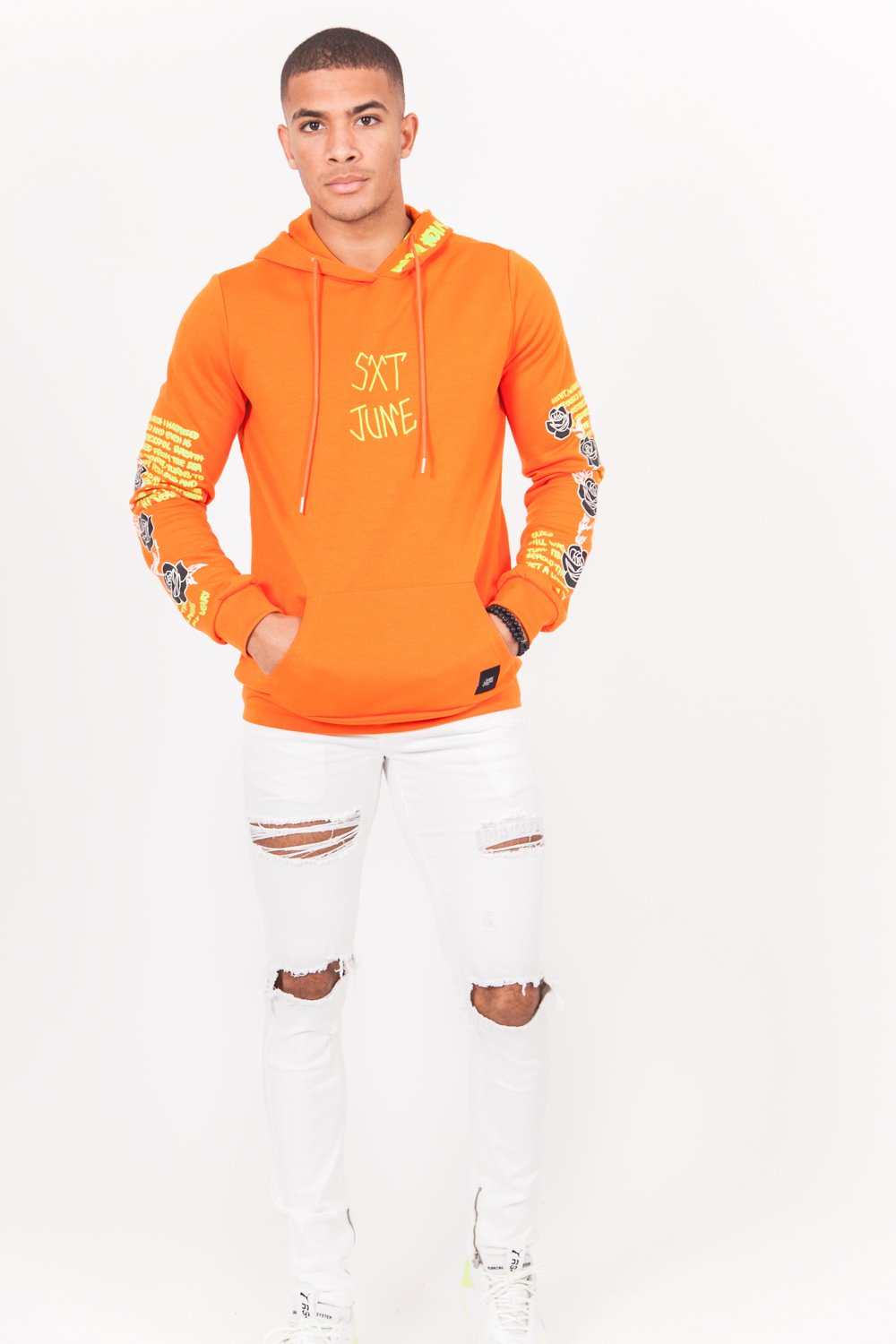 Sweat capuche imprimé tête de mort orange