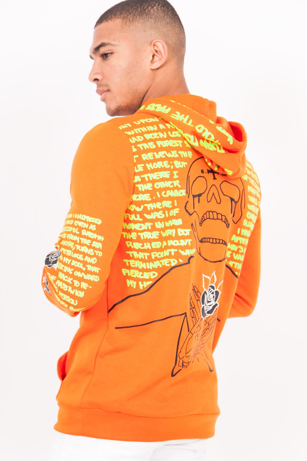 Sweat capuche imprimé tête de mort orange