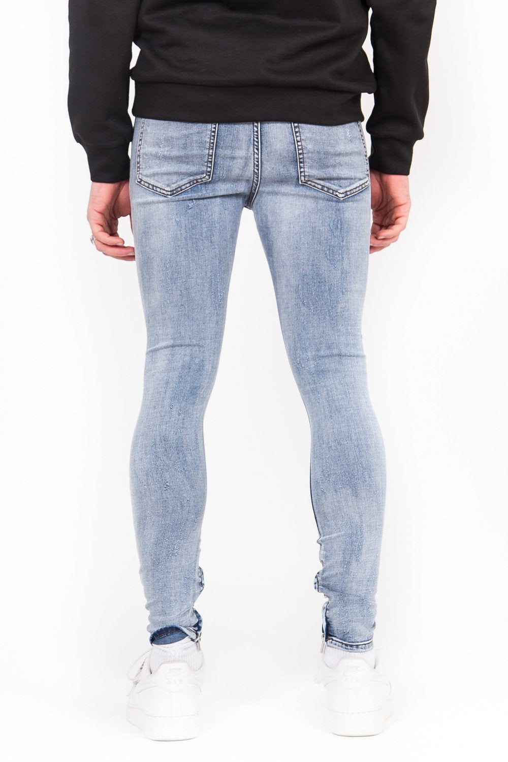 Blaue Destroyed-Jeans mit Reißverschluss