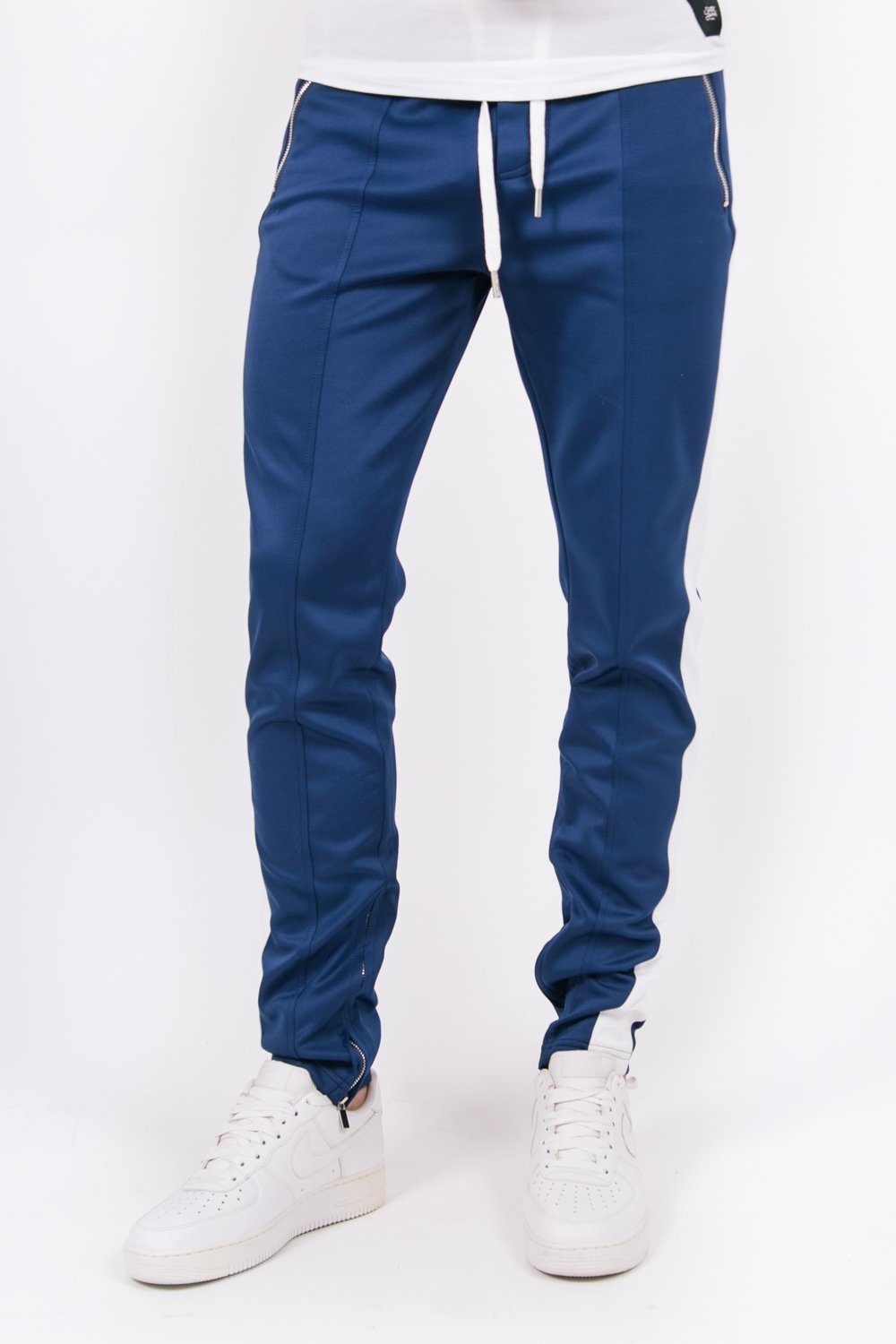 Jogging bicolores zips bleu blanc
