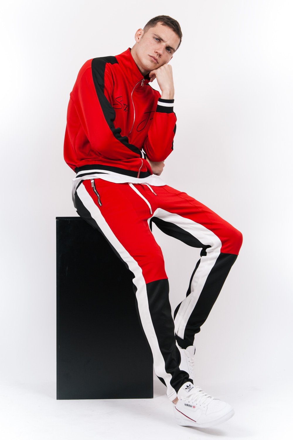 tricolor black red joggers white