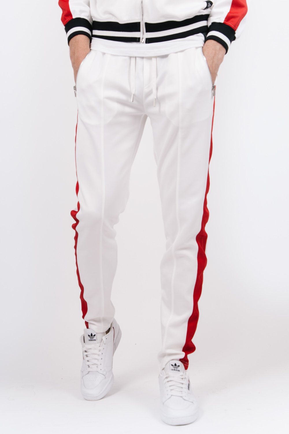 Zweifarbige Jogginghose mit weißen und roten Reißverschlüssen