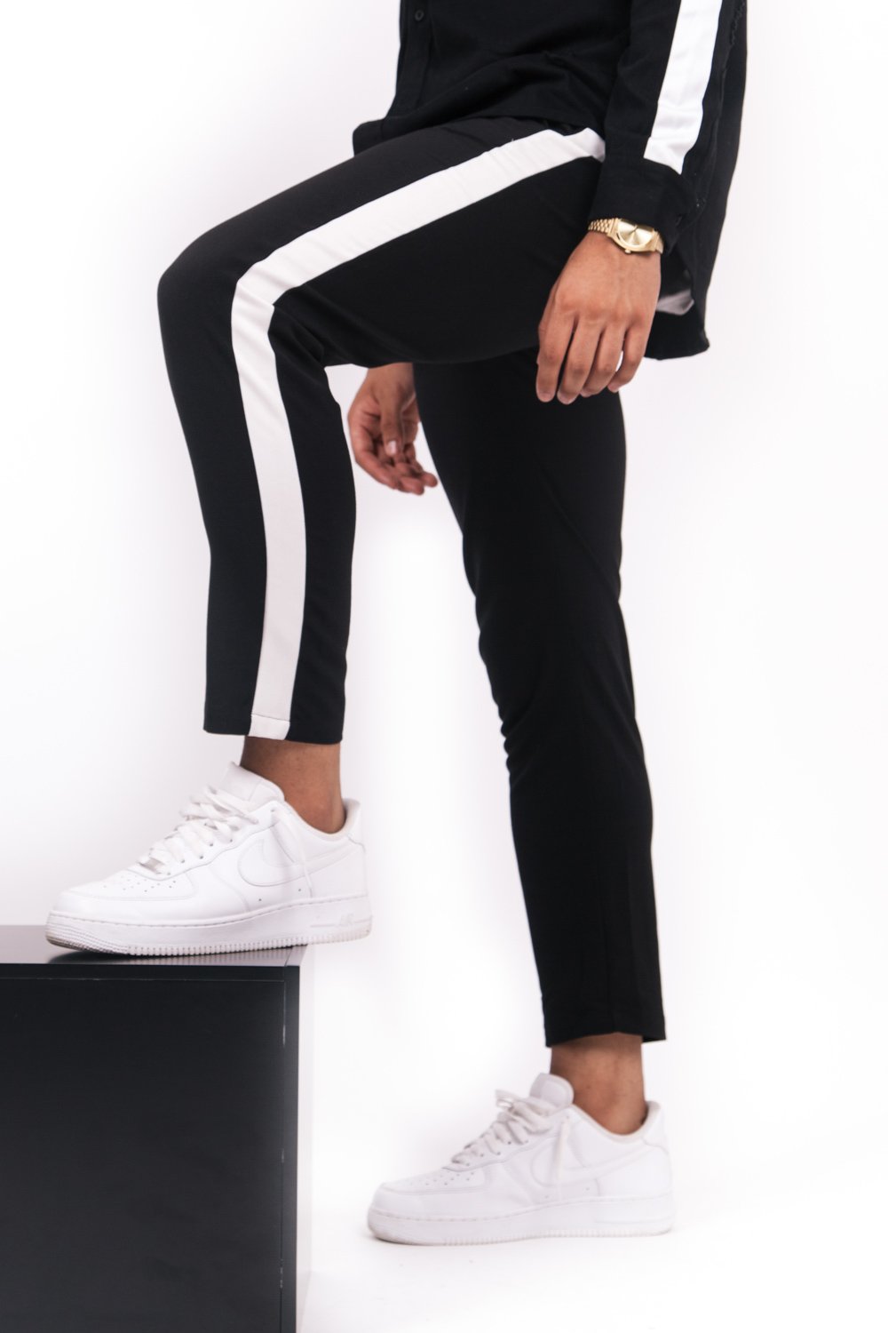 flowing bands white pants black