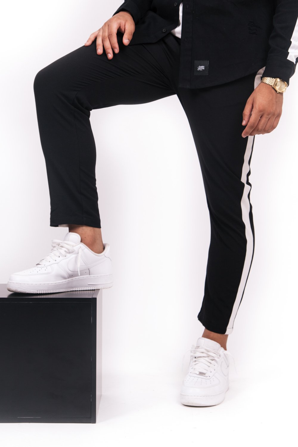 flowing bands white pants black