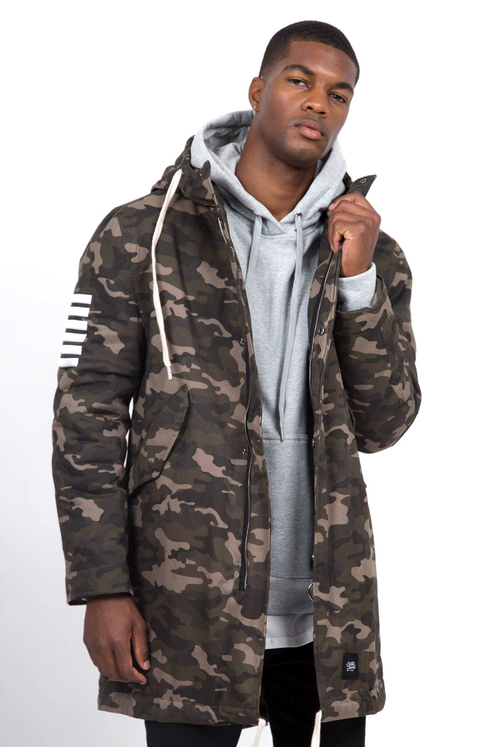 Camouflage-Parka mit grünen Aufnähern