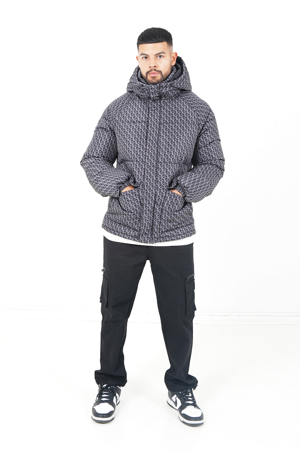 Monogram padded puffer Black