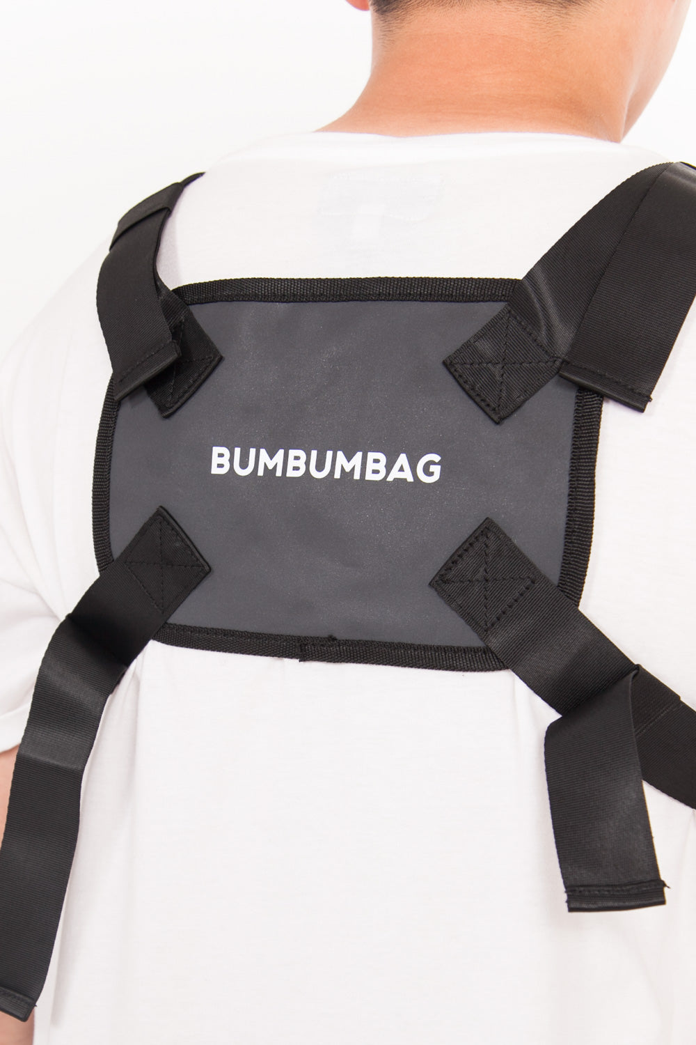 BumBumBag - Petit sac poitrine réfléchissant logo noir