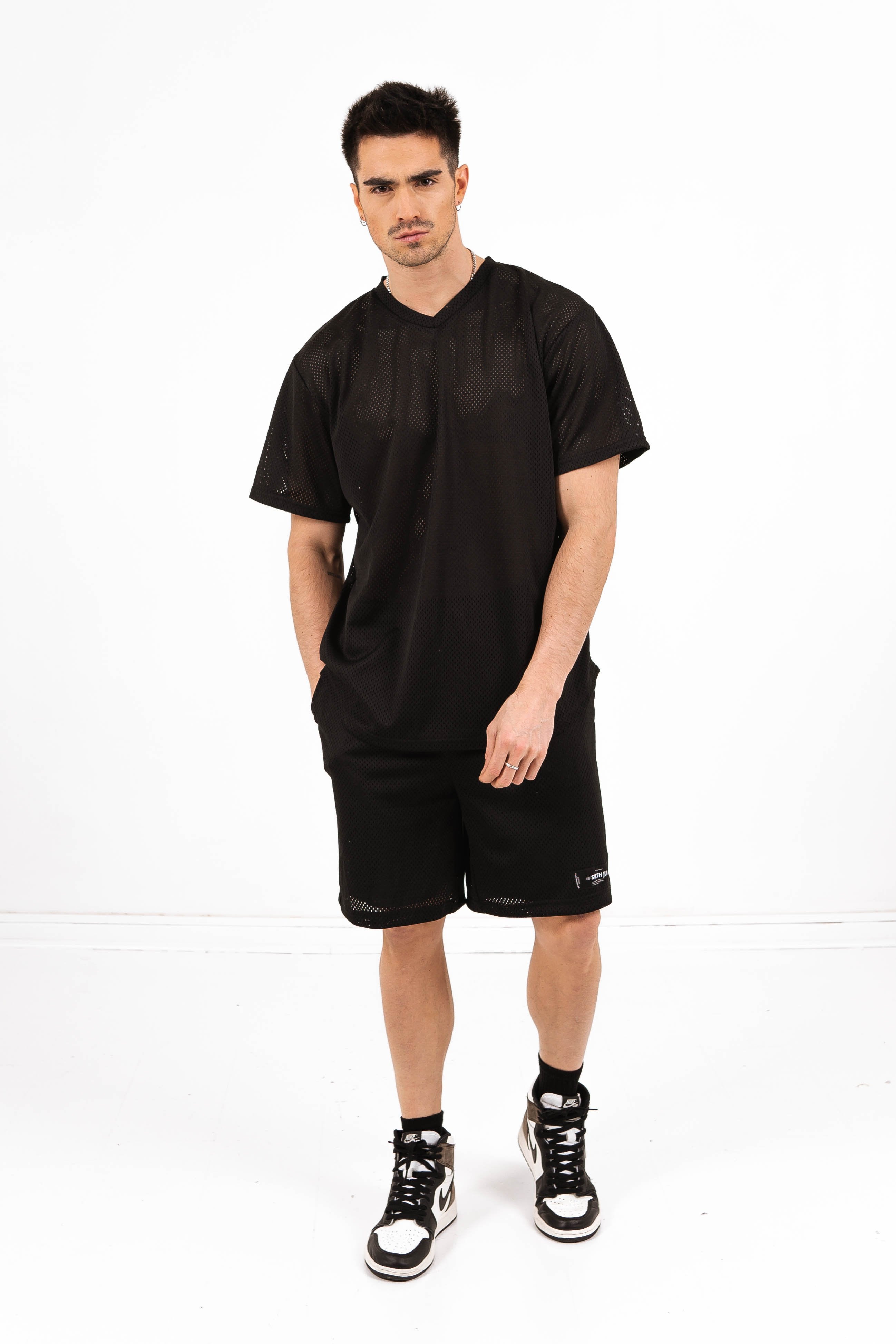 Schwarze Mesh-Shorts mit Logo