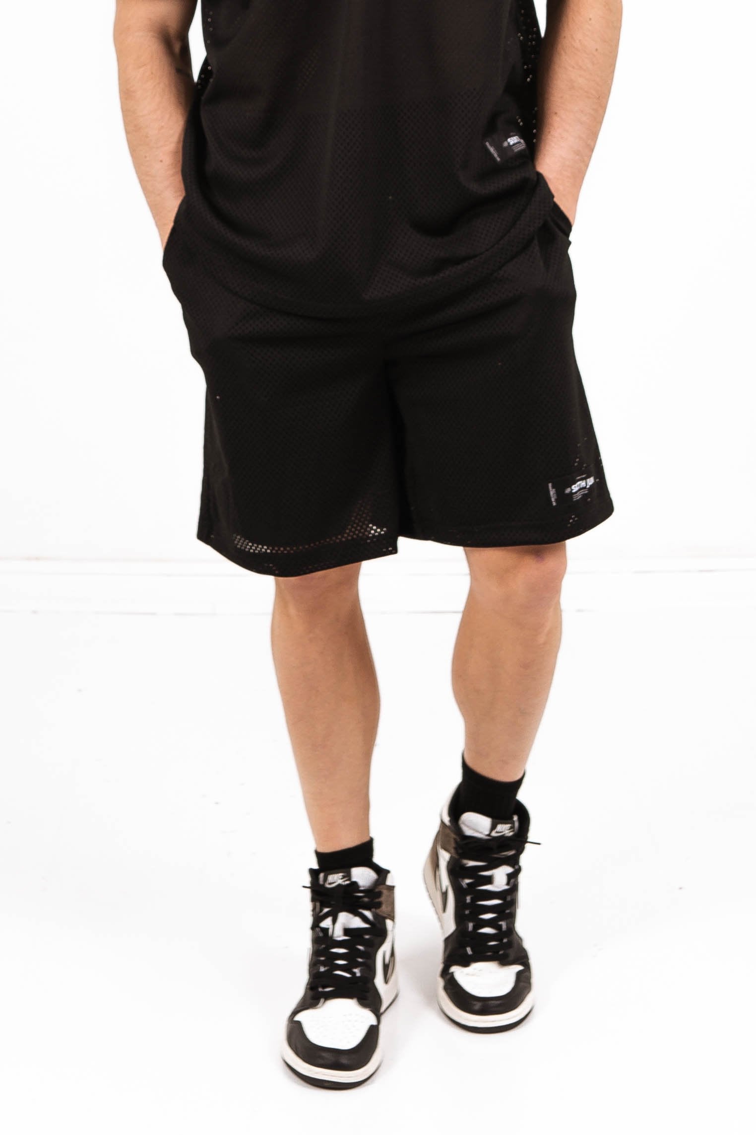 Schwarze Mesh-Shorts mit Logo