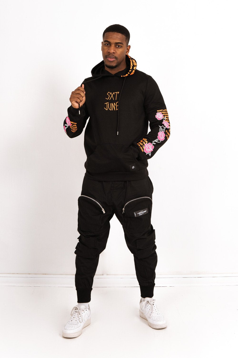 Sweat capuche imprimé tête de mort noir orange