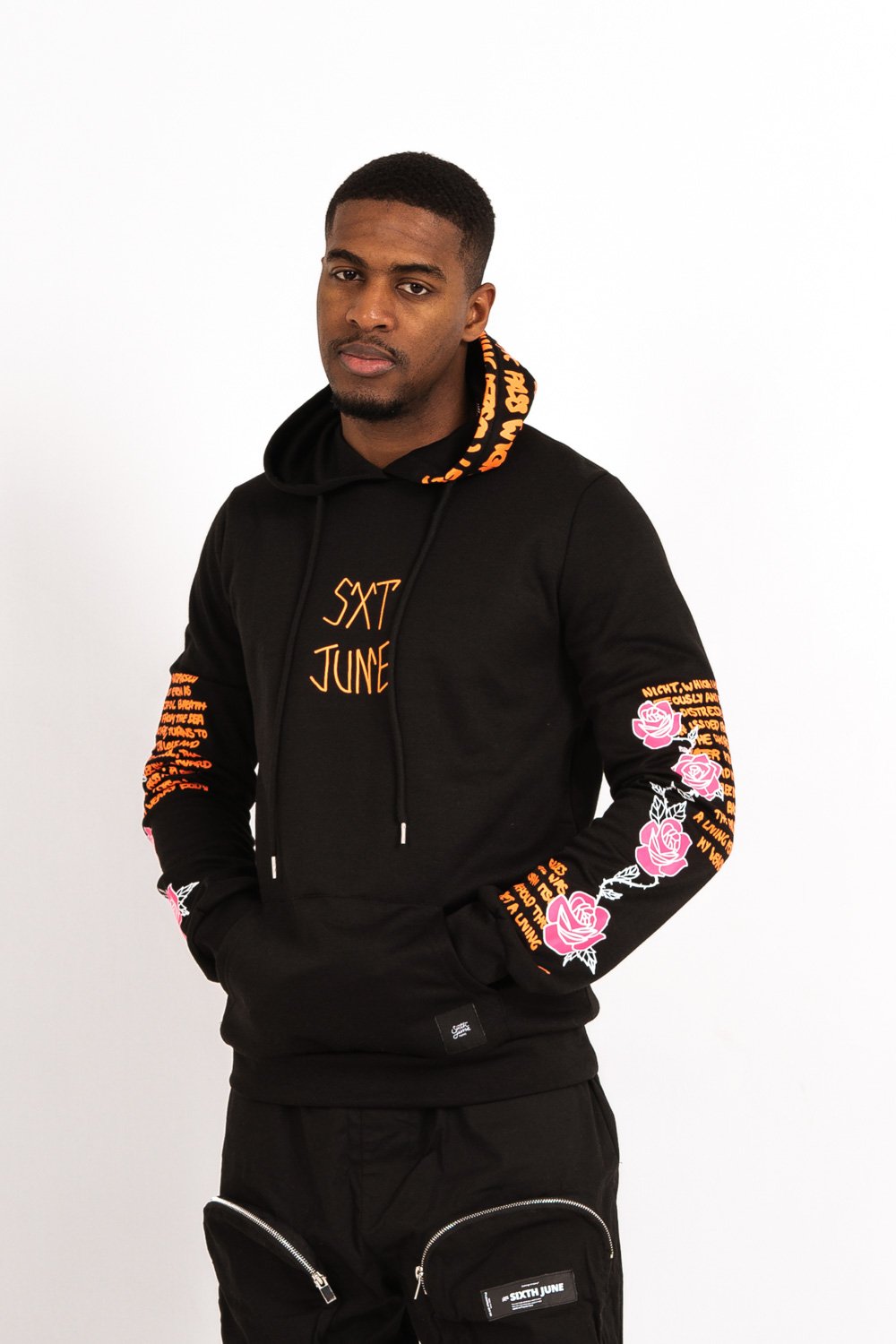 Sweat capuche imprimé tête de mort noir orange