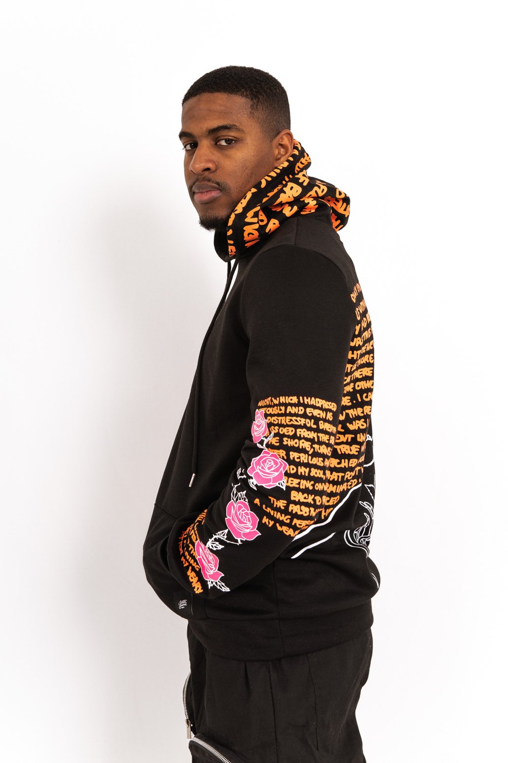 Sweat capuche imprimé tête de mort noir orange