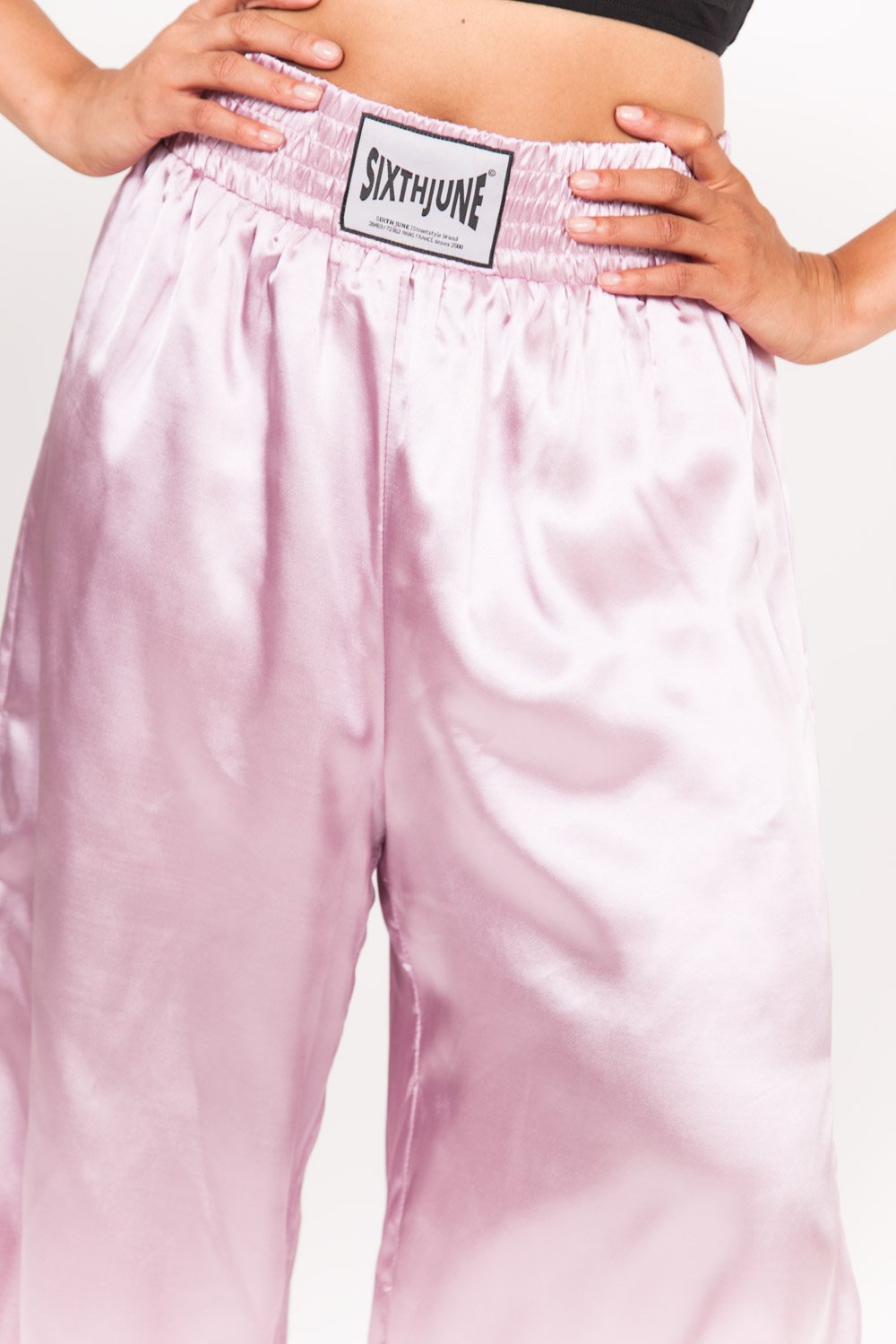 Pantalon évasé boxe logo rose