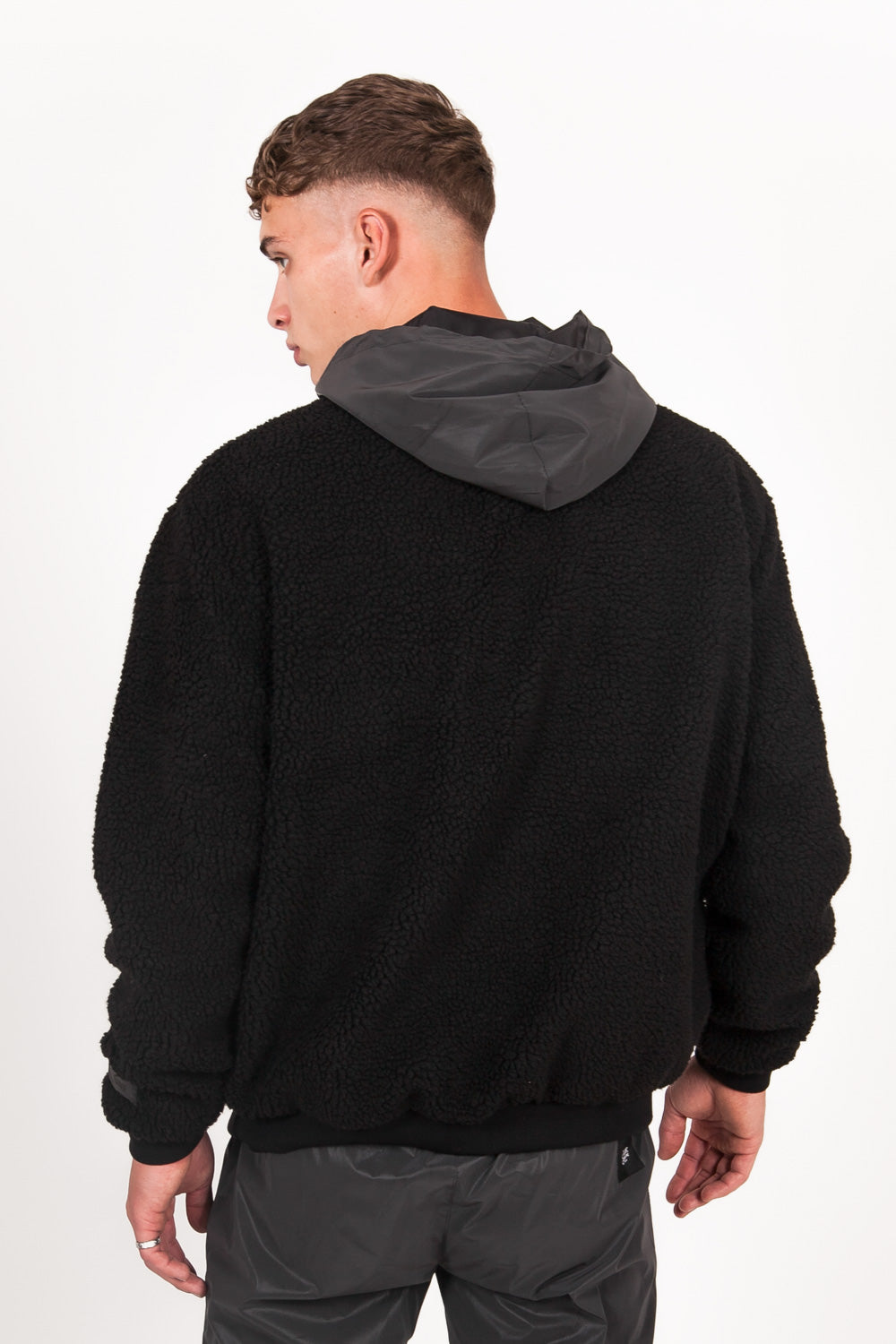 Sixth June - Sweat sherpa poche réfléchissante noir