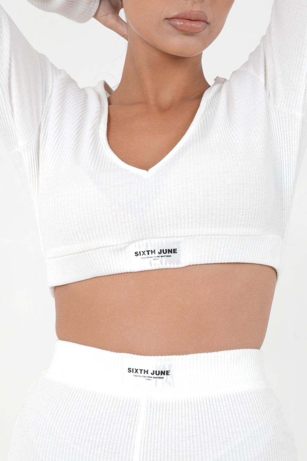 Geripptes Langarmshirt in gebrochenem Weiß